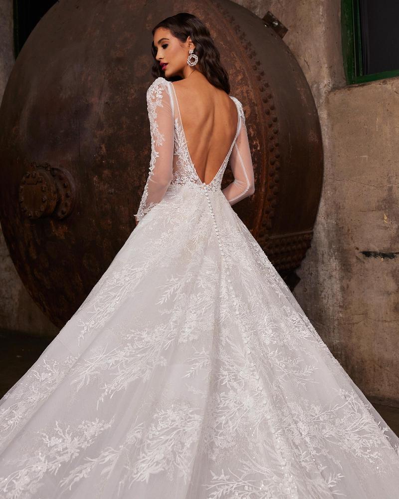 122230 long sleeve lace wedding dress with open back and a line silhouette2